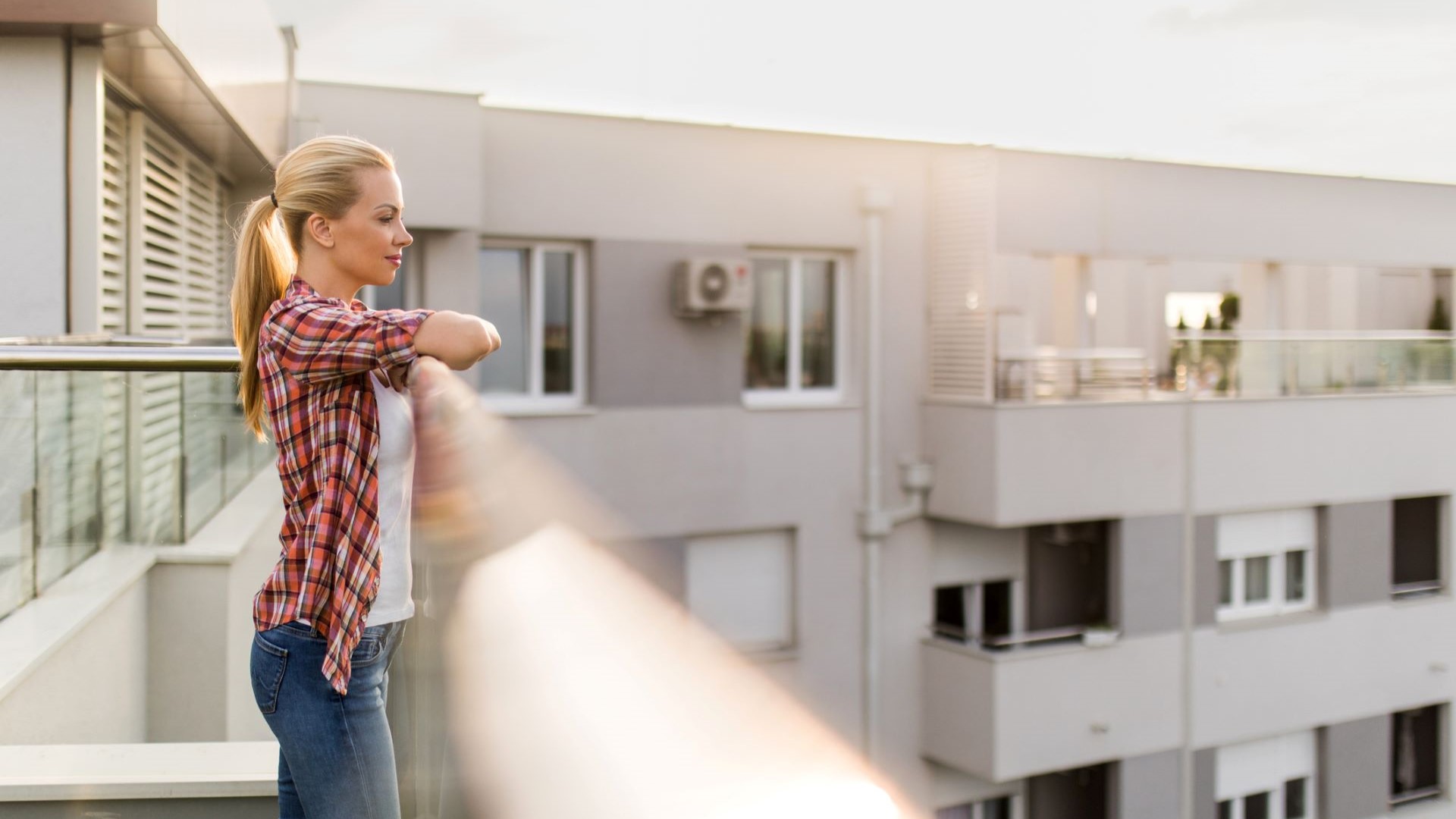 student standing on balcony